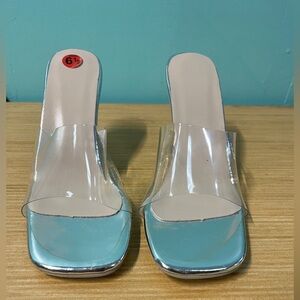 Clear plastic single wide strap silver base clear flat heel heels. Like NEW!